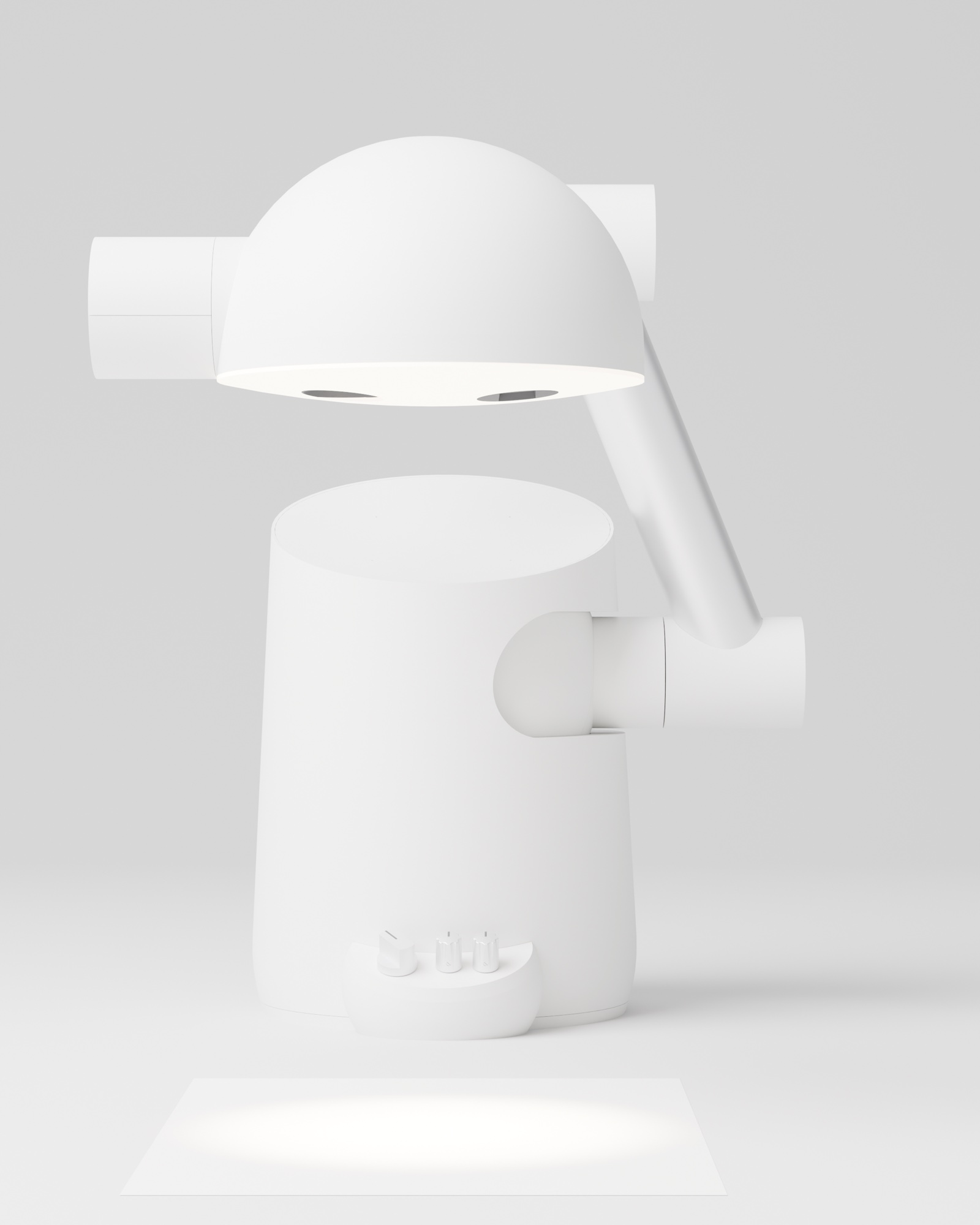 Tangi from the front: its head over the drum, the arm beside it and the control panel low on the drum